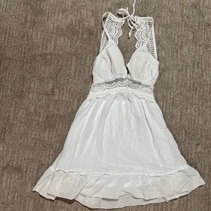 Summer dress. With lace back straps & open back. Padded front.